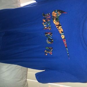 Blue nike shirt with floral Nike check